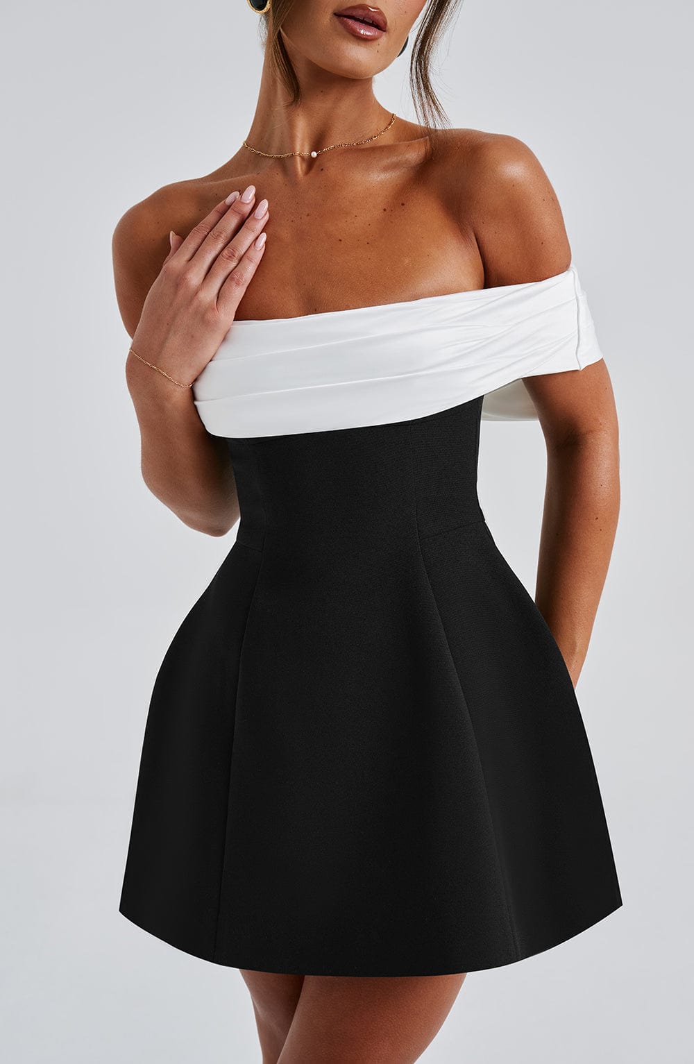 Women’s Off-Shoulder Mini Dress with Contrast Bow Back and Structured Skirt
