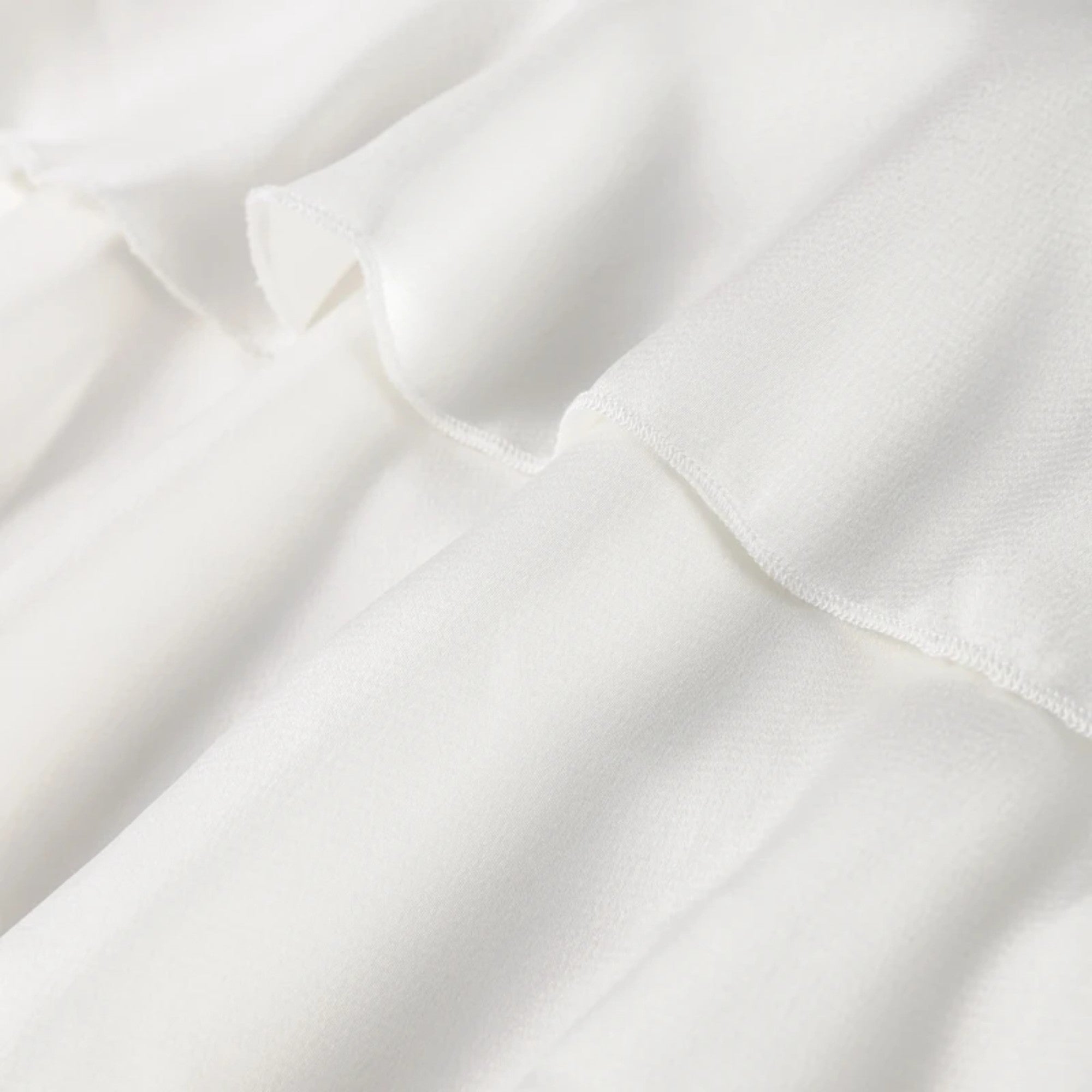 Women’s Elegant Ruffled Blouse with High Neckline and Soft Flowing Silhouette