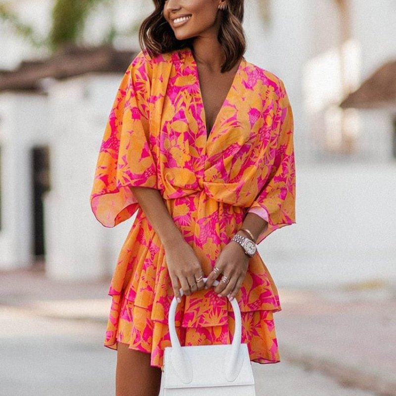 Women’s Floral Wrap Mini Dress with Ruffle Hem and Flowing Sleeves